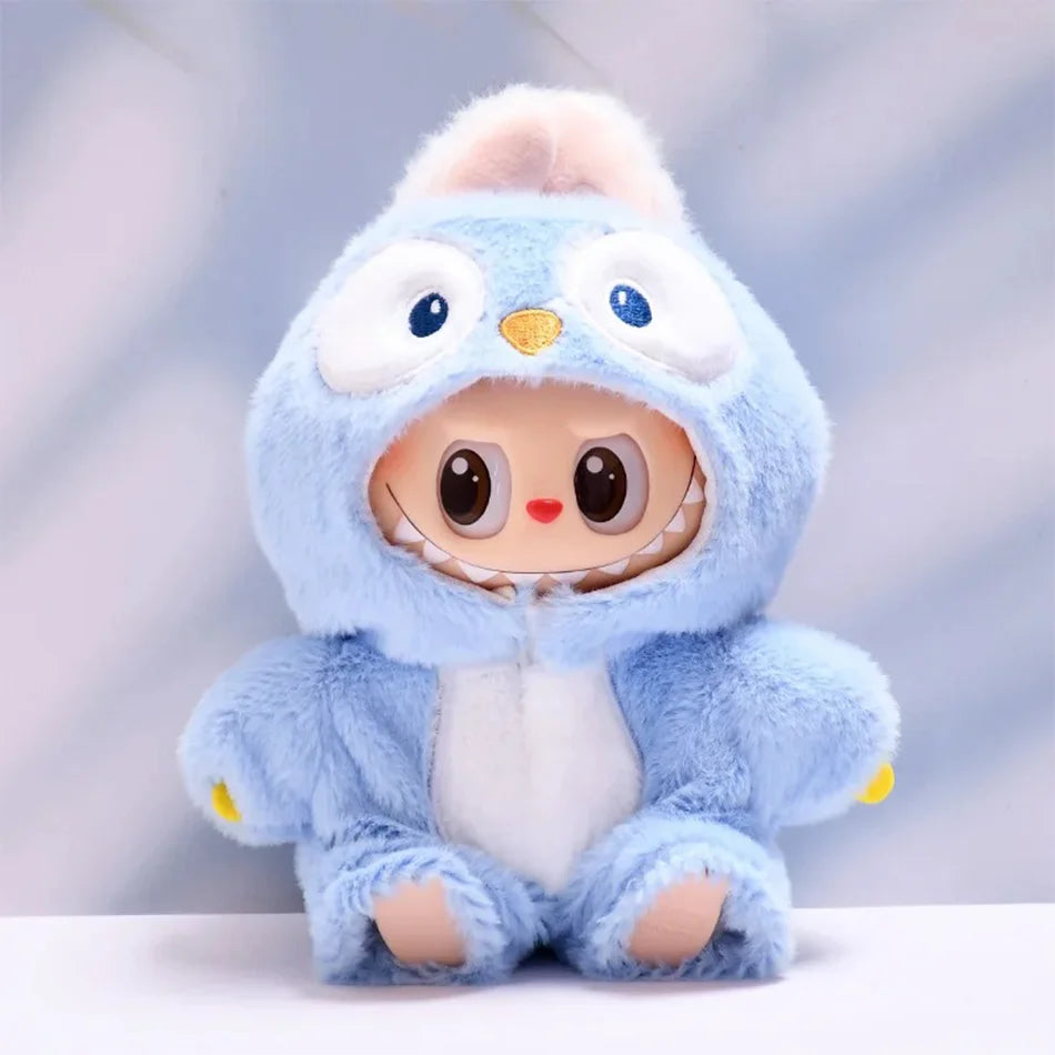 A cute, fluffy blue labubu monster plush toy with big eyes and a smiling face.